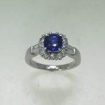 White gold diamond-accented cushion-cut blue sapphire ring